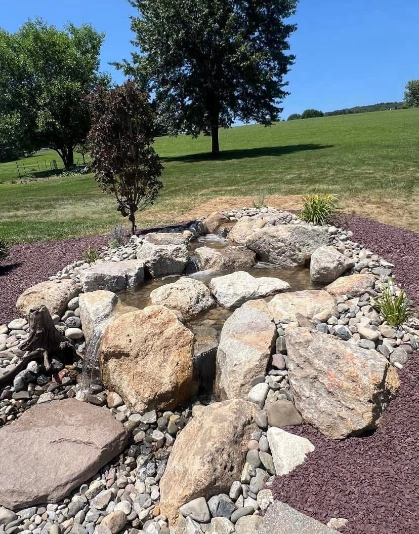 Finished boulder pondless waterfall installed in Carbon County, PA